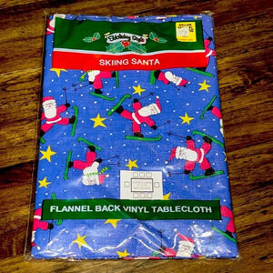 NWT VTG Holiday Style Flannel Back Vinyl Tablecloth 52x70 Rectangle Skiing Santa